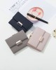 Prettyzys' popular Korean-style short, tri-folded women's wallet, a fresh, PU, ​​plaid, and zippered student wallet.