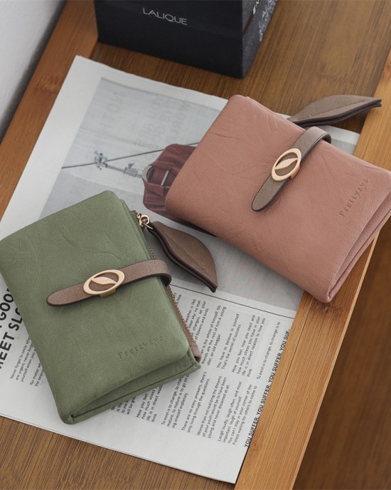New women's short wallet, European and American style, simple, PU zippered and clasp, foldable clutch, student coin purse wholesale. New women's short wallet, European and American style, simple, PU zippered and clasp, foldable clutch, student coin purse wholesale.