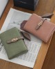 New women's short wallet, European and American style, simple, PU zippered and clasp, foldable clutch, student coin purse wholesale. New women's short wallet, European and American style, simple, PU zippered and clasp, foldable clutch, student coin purse wholesale.