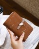 Lianbu women's mid-length, multifunctional, simple PU wallet with large capacity, printed buckle, zippered wallet, and card holder. Lianbu women's mid-length, multifunctional, simple PU wallet with large capacity, printed buckle, zippered wallet, and card holder.